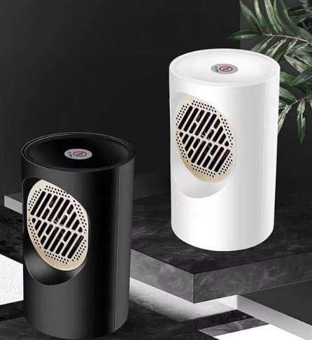 - Calentador de Escritorio Mini con Asa Redonda – 700W de Calor Potente